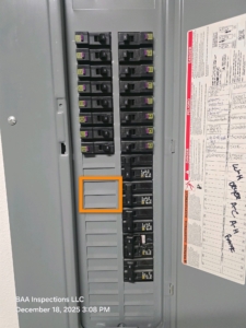 New-construction electrical panel missing a whole-home surge protective device, documented during a final inspection prior to closing.