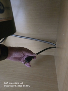 Dishwasher power cord too short to reach the electrical receptacle, rendering the appliance inoperable at the time of the final inspection.